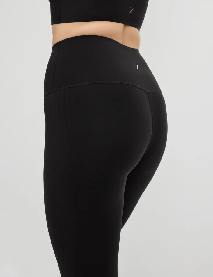 | Front view of model highlighting the coverage and fit | Black