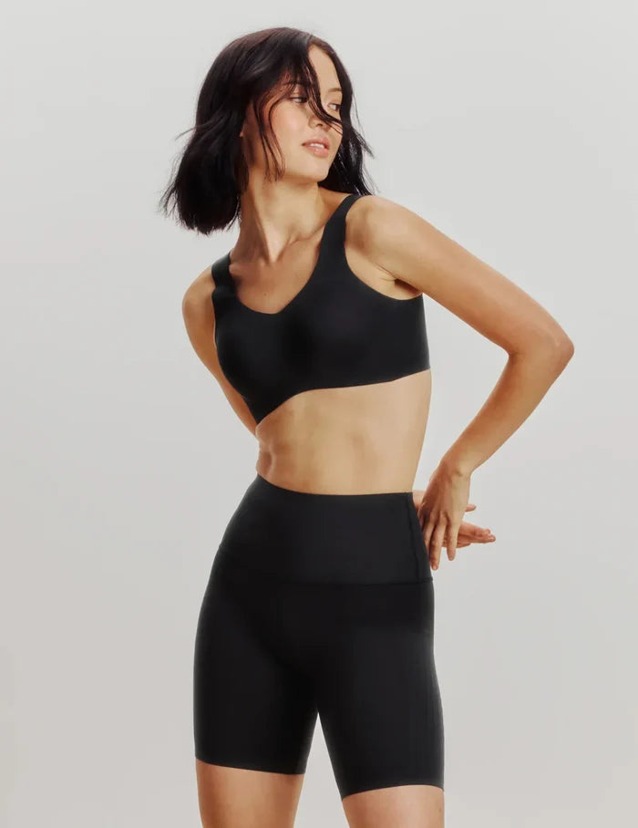 | Front view of model highlighting the coverage and fit | Black