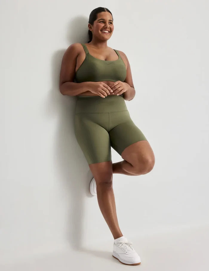 | Front view of model highlighting the coverage and fit | Olive