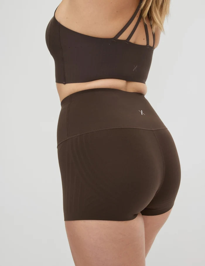 | Front view of model highlighting the coverage and fit | Espresso