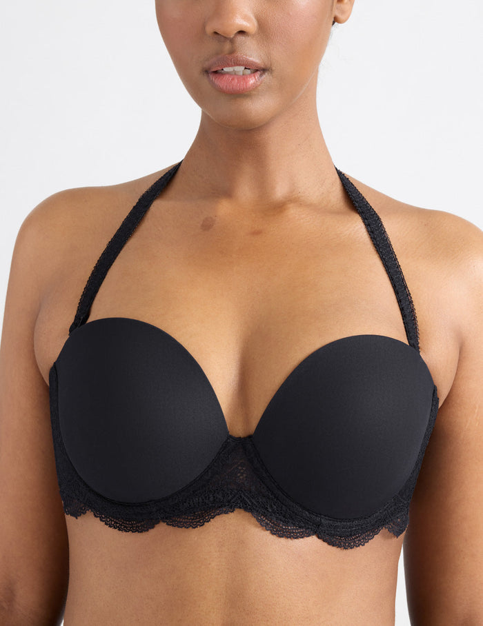 | View of model wearing the Karma Strapless Bra, highlighting the neckline, support level, and strapless design | Black