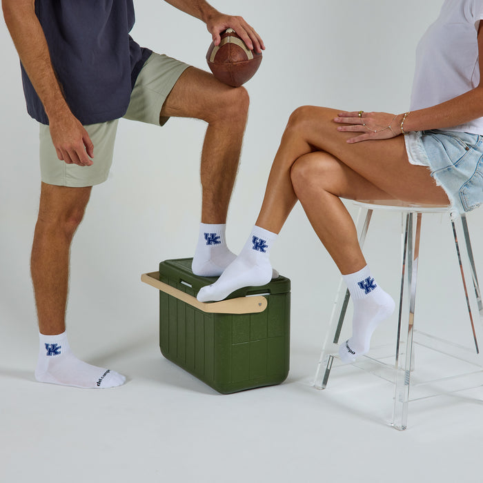 Two models wearing Del Campo Kentucky Wildcats golf socks in studio