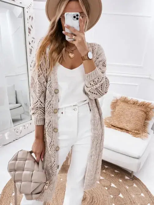 Off white to light beige open knit cardigan is button up style with elegance and casual blended to perfection