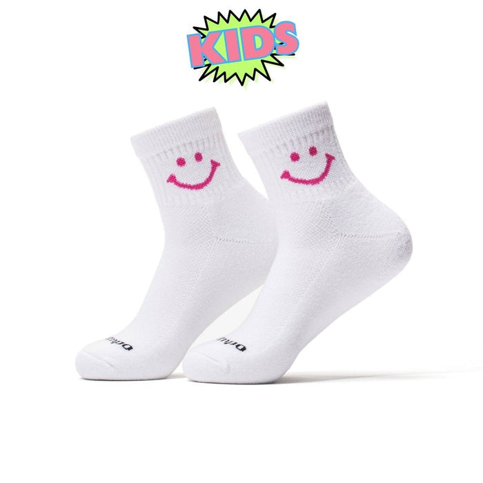 Del Campo Kids Pack golf socks featuring four kids' designs: smiley, blue smiley, pink smiley, and 1776