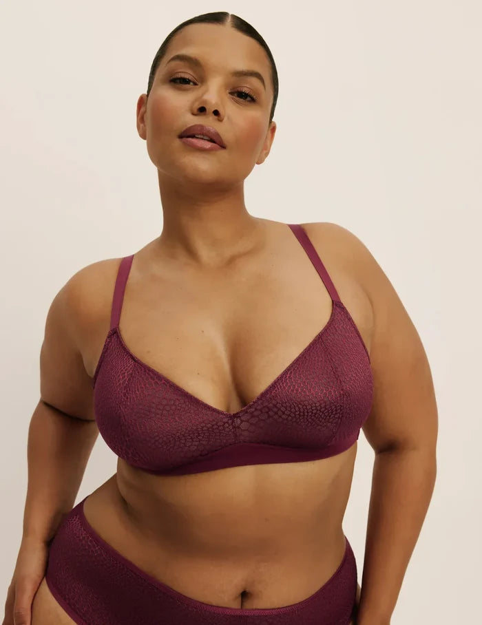 | Front view of model wearing the Lace Bra, highlighting the neckline, strap design, and  silhouette | Dark Cherry