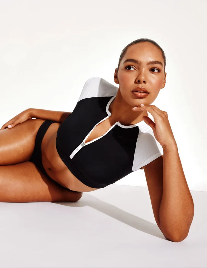 | Front view of model wearing the Leakproof Sculpt Bikini Swim Bottom highlighting the coverage and fit | 
Black