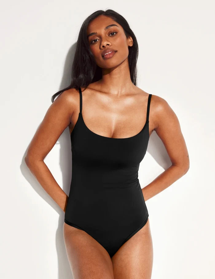 | Front view of model wearing the Leakproof Sculpt Classic One Piece Swimsuit highlighting the neckline, coverage and fit | Black