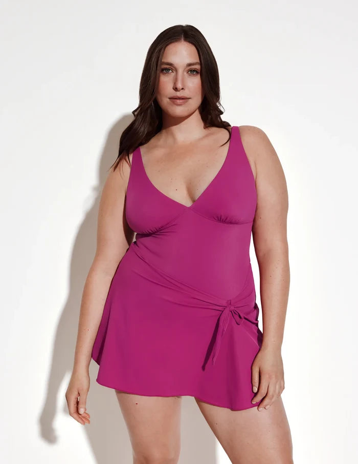 | Front view of model wearing the Leakproof Sculpt Deep V Swim Dress highlighting the coverage and fit | Deep Orchid