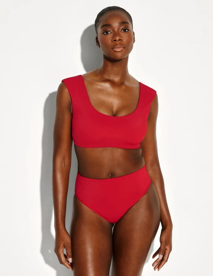 | Front view of model wearing the Leakproof Sculpt High Rise Bikini Swim Bottom highlighting the coverage and fit | Cherry
