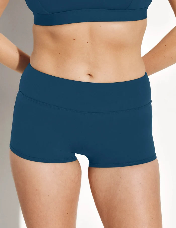 | Front view of model wearing the Leakproof Sculpt Swim Short highlighting the coverage and fit | Horizon