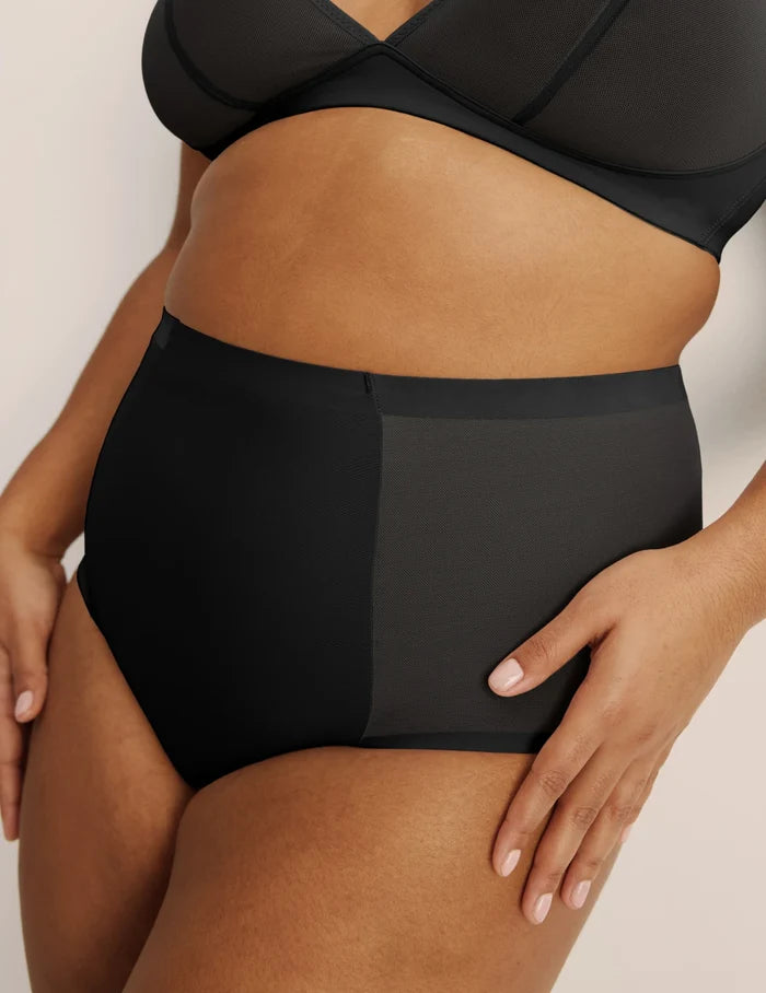 | Front view of model highlighting the coverage and fit | Black