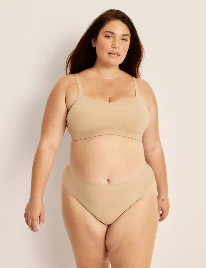 | Front view of model highlighting the coverage and fit | Warm Sand