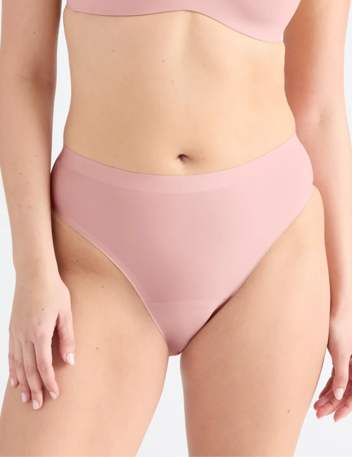 Isabelle has 40” hips and wearing KNIX M | Front view of model wearing the Leakproof UltraThin No-Show French Cut highlighting the coverage and smooth fit | Rose Water