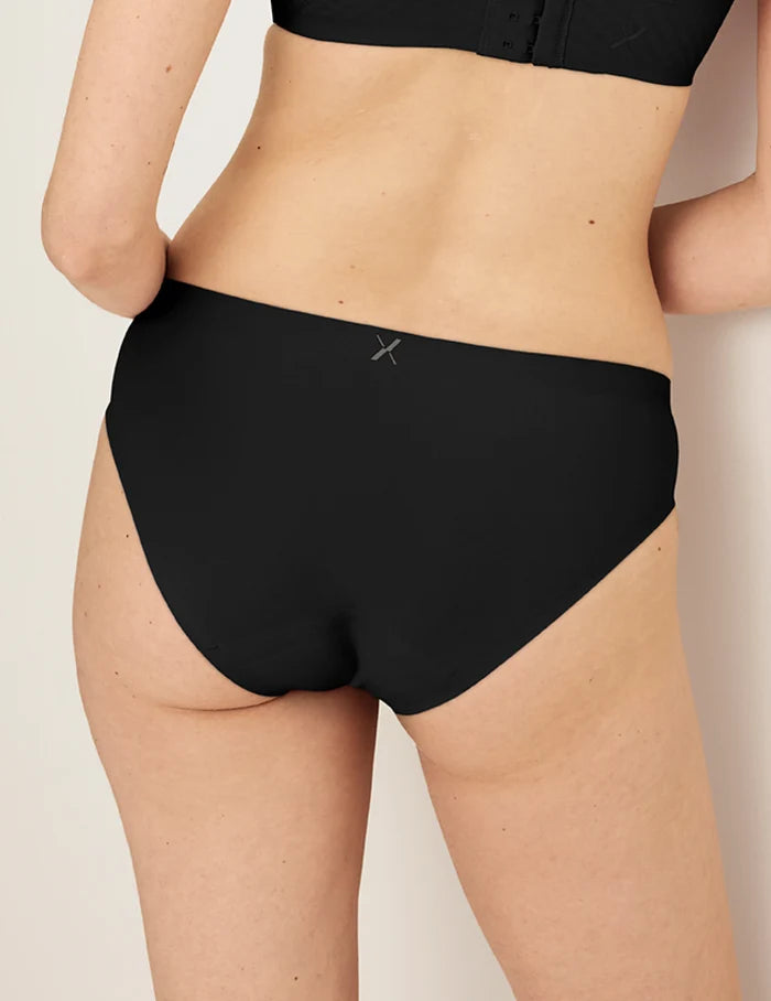 | Back view of model wearing the Light Leakproof No-Show Bikini highlighting the coverage and smooth fit | Black