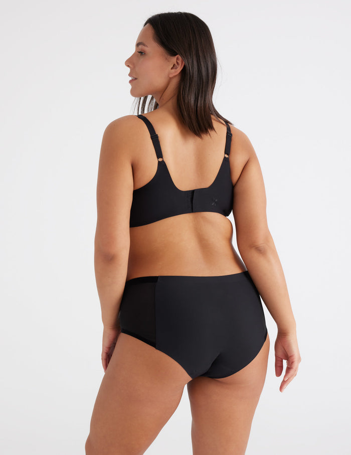 | Front view of model highlighting the coverage and fit | Black