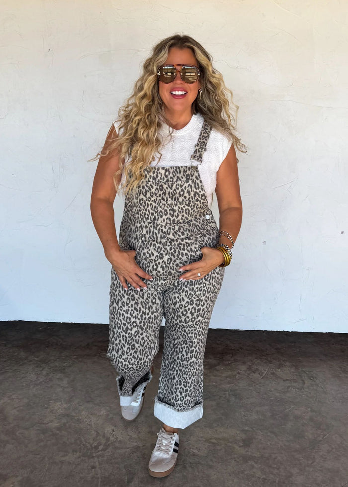 Leopard bib- overalls that are made of stretch fabric