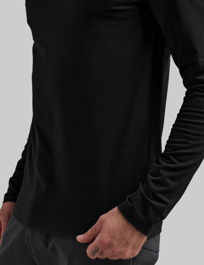 | Front view of model wearing the Men's Best Damn Long Sleeve highlighting the coverage and fit | Black