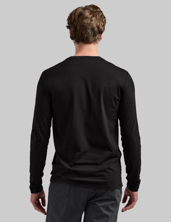 | Back view of model wearing the Men's Best Damn Long Sleeve highlighting the coverage and fit | Black