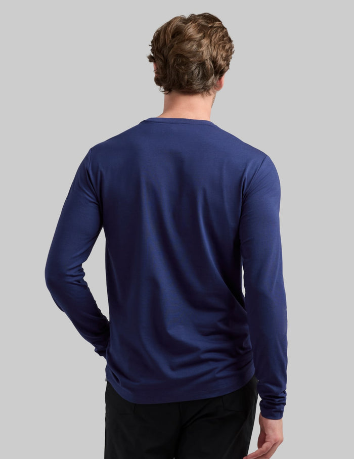 | Back view of model wearing the Men's Best Damn Long Sleeve highlighting the coverage and fit | Midnight