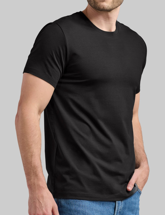 | Front view of model wearing the Men's Best Damn Tee highlighting the coverage and fit | Black