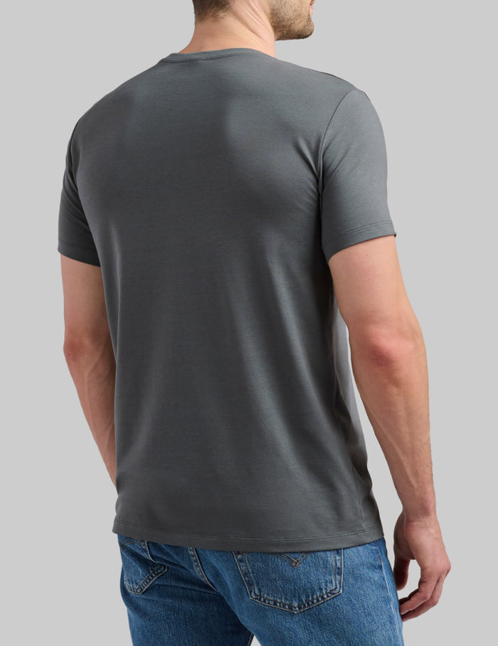 | Back view of model wearing the Men's Best Damn Tee highlighting the coverage and fit | Pewter