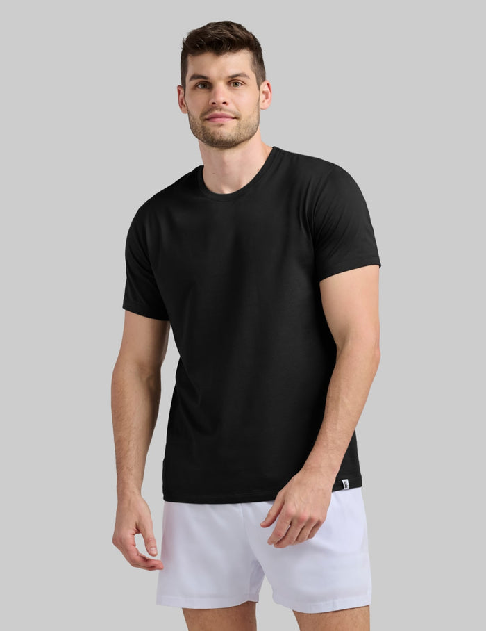 | Front view of model wearing the Men's CoolShift™ Tee highlighting the coverage and fit | Black