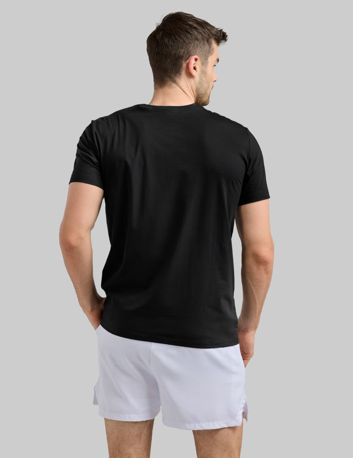 | Back view of model wearing the Men's CoolShift™ Tee highlighting the coverage and fit | Black