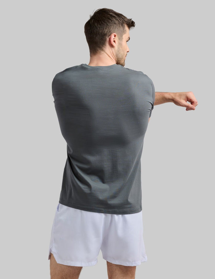 | Back view of model wearing the Men's CoolShift™ Tee highlighting the coverage and fit | Pewter