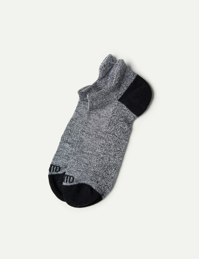 | Men's Non-Stop Ankle Socks shown front-facing against a light gray background | Black/White