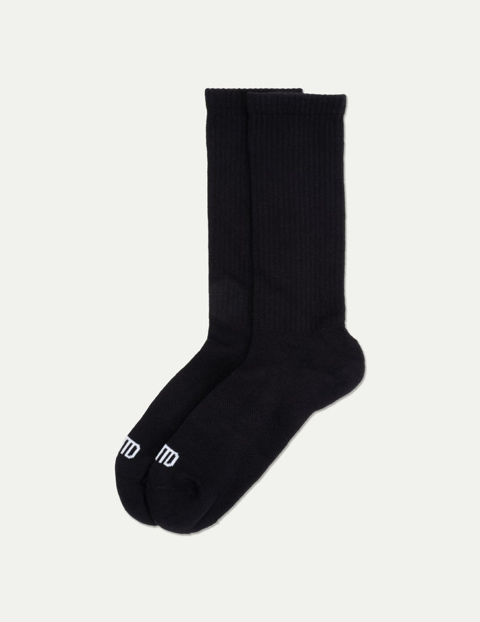 | Men's Non-Stop Crew Socks shown front-facing against a light gray background | Black