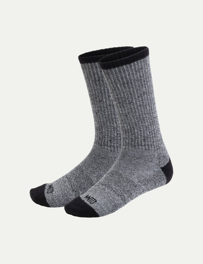 | Men's Non-Stop Crew Socks shown front-facing against a light gray background | Black/White
