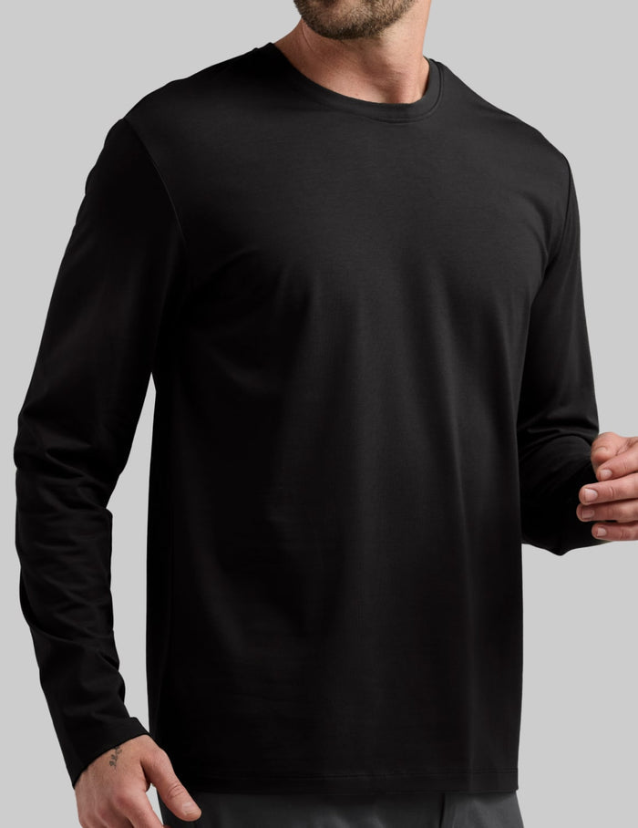 | Front view of model wearing the Men's Relaxed Fit Best Damn Long Sleeve highlighting the coverage and fit | Black