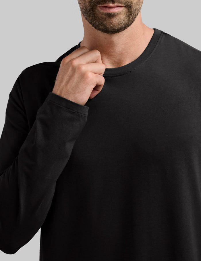 | Front view of model wearing the Men's Relaxed Fit Best Damn Long Sleeve highlighting the coverage and fit | Black
