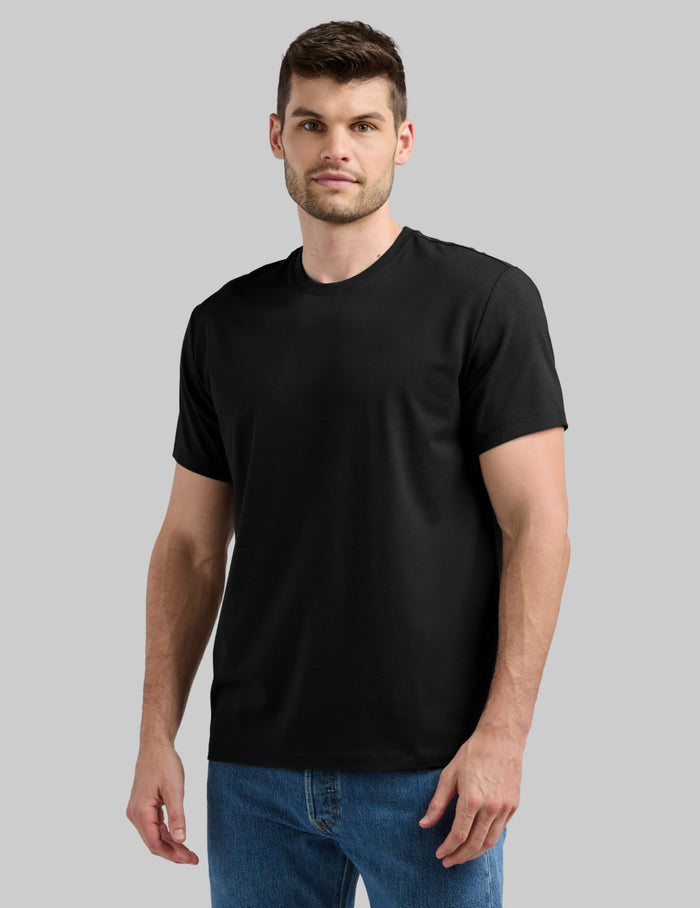 | Front view of model wearing the Men's Relaxed Fit Best Damn Tee highlighting the coverage and fit | Black