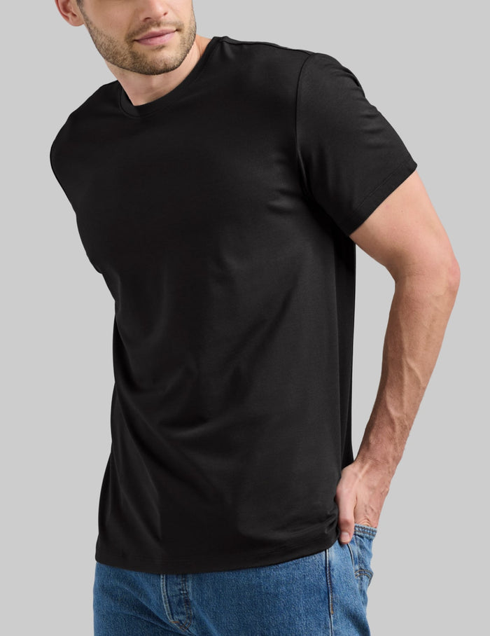 | Front view of model wearing the Men's Relaxed Fit Best Damn Tee highlighting the coverage and fit | Black