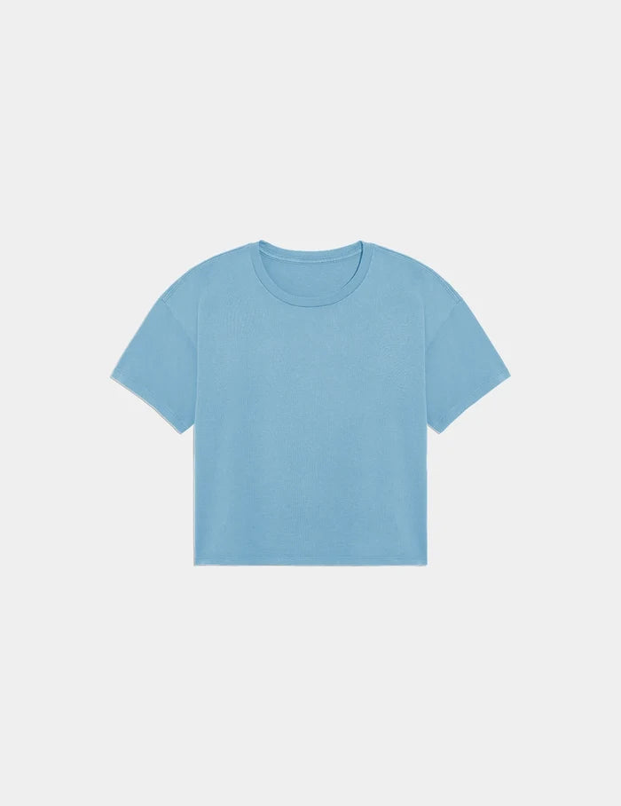 | Mineral-Dyed Cotton T-Shirt shown front-facing against a light gray background | Washed Blue Mist