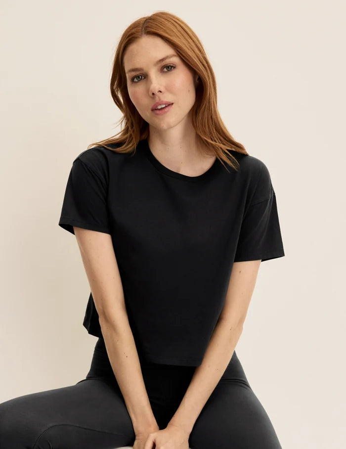 | Front view of model wearing the Mineral-Dyed Cotton T-Shirt highlighting the coverage and fit | Washed Black