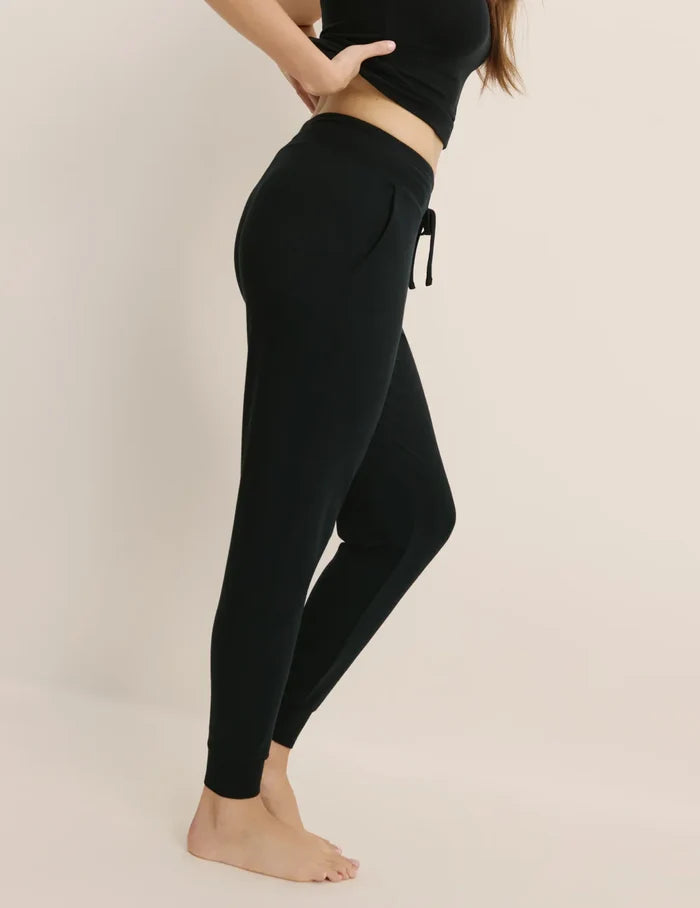 | Side view of model wearing the Modal Jogger highlighting the coverage and fit | Black