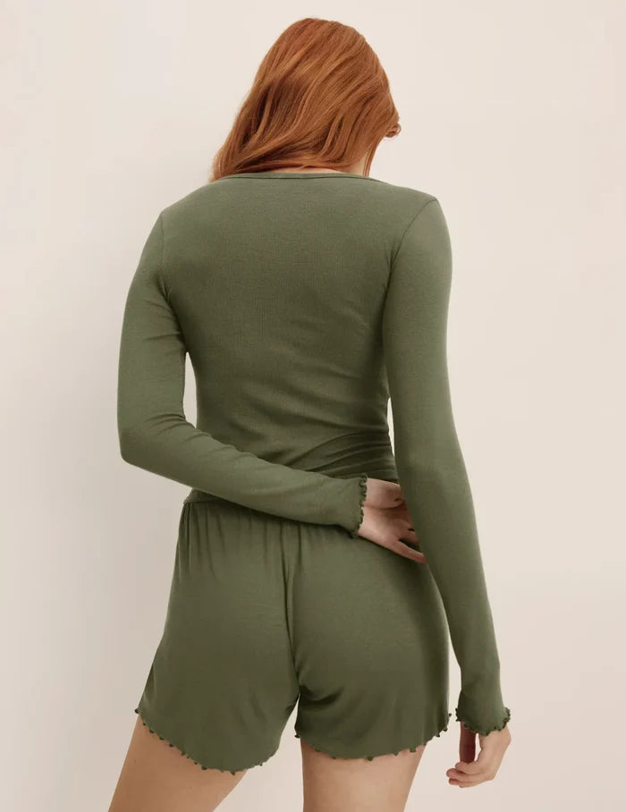 | Back view of model wearing the Modal Rib Henley Sleep Set highlighting the coverage and fit | Olive