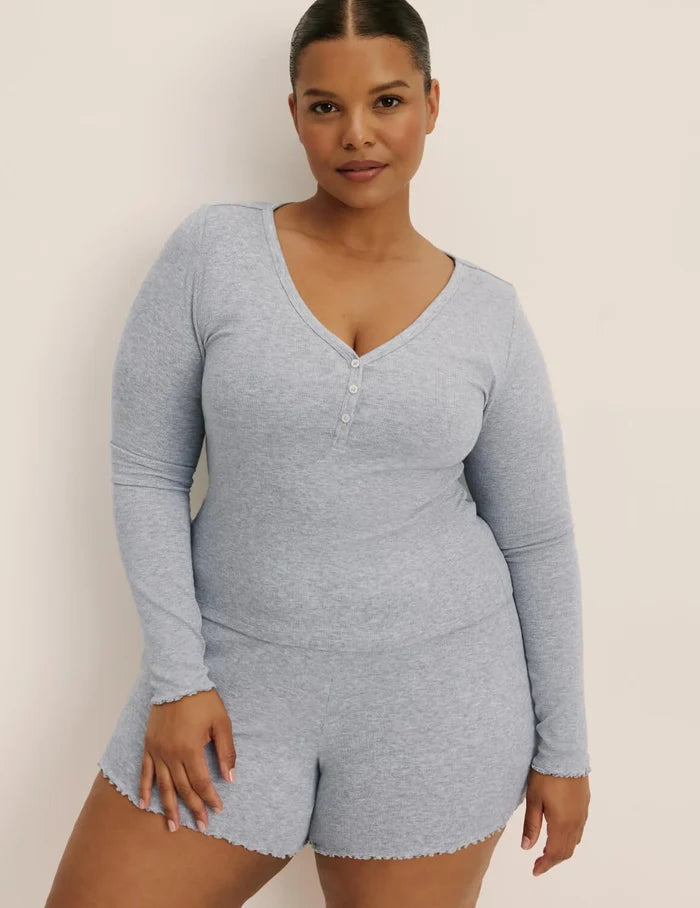 | Front view of model wearing the Modal Rib Long Sleeve Henley highlighting the coverage and fit | Heathered Grey