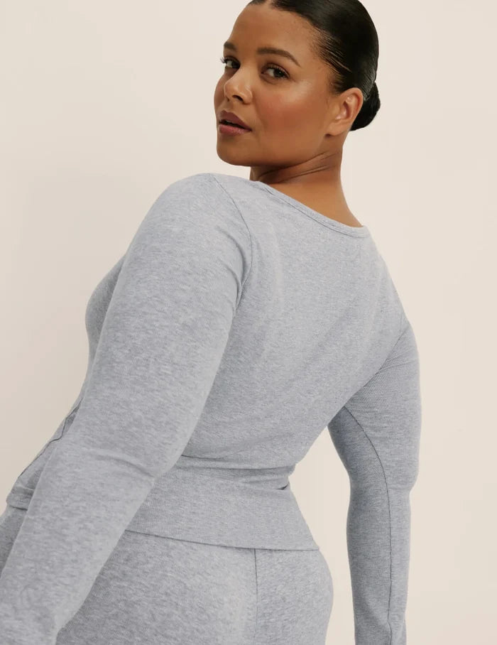 | Back view of model wearing the Modal Rib Long Sleeve Henley highlighting the coverage and fit | Heathered Grey