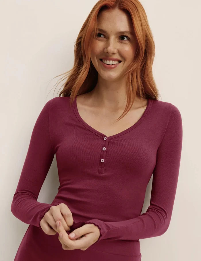 | Front view of model wearing the Modal Rib Long Sleeve Henley highlighting the coverage and fit | Dark Cherry