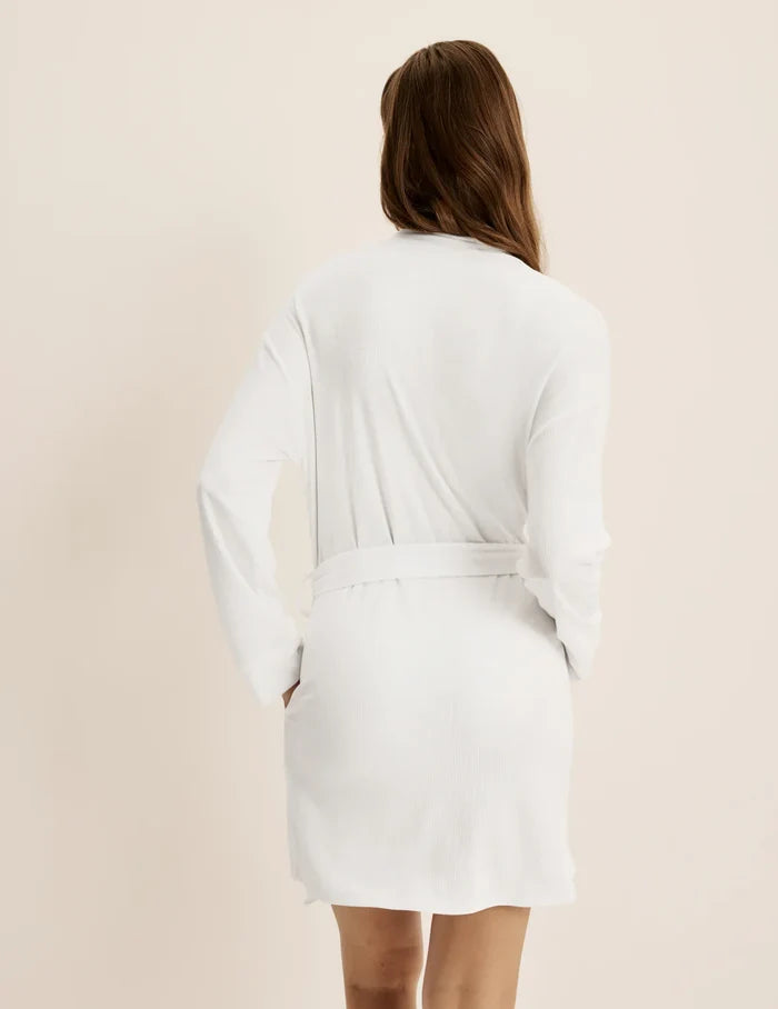 | Front view of model highlighting the coverage and fit | White