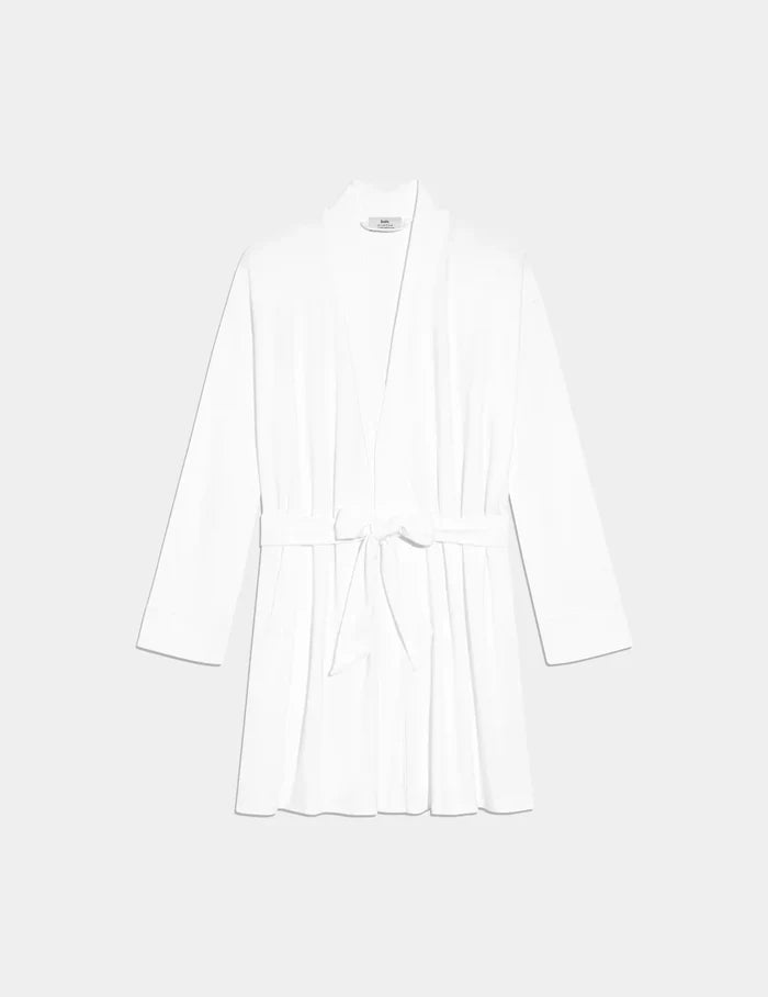 | Front view of model highlighting the coverage and fit | White