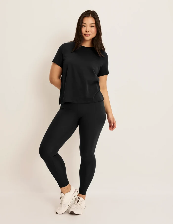 | Front view of model wearing the Modal Ultra Soft Legging highlighting the coverage and fit | Black