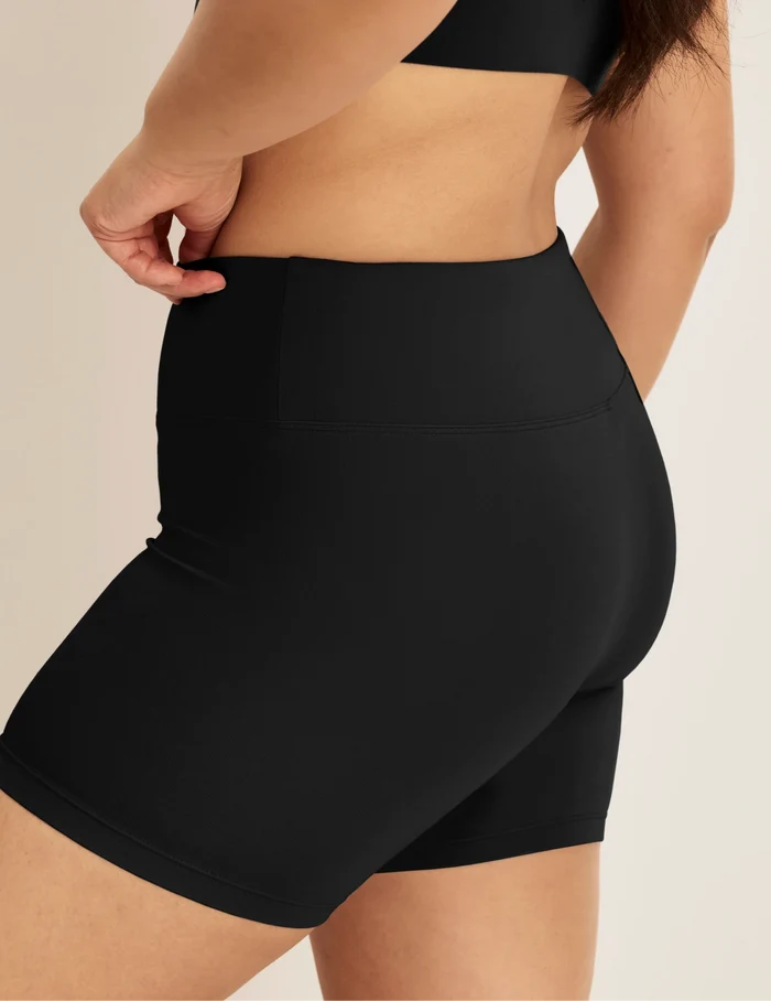 | Side view of model wearing the Modal Ultra Soft Shorts highlighting the coverage and fit | Black