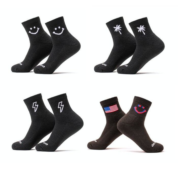 Del Campo Night Mode Pack golf socks featuring all four Night Mode designs: bolt, palm, smiley, and 1776