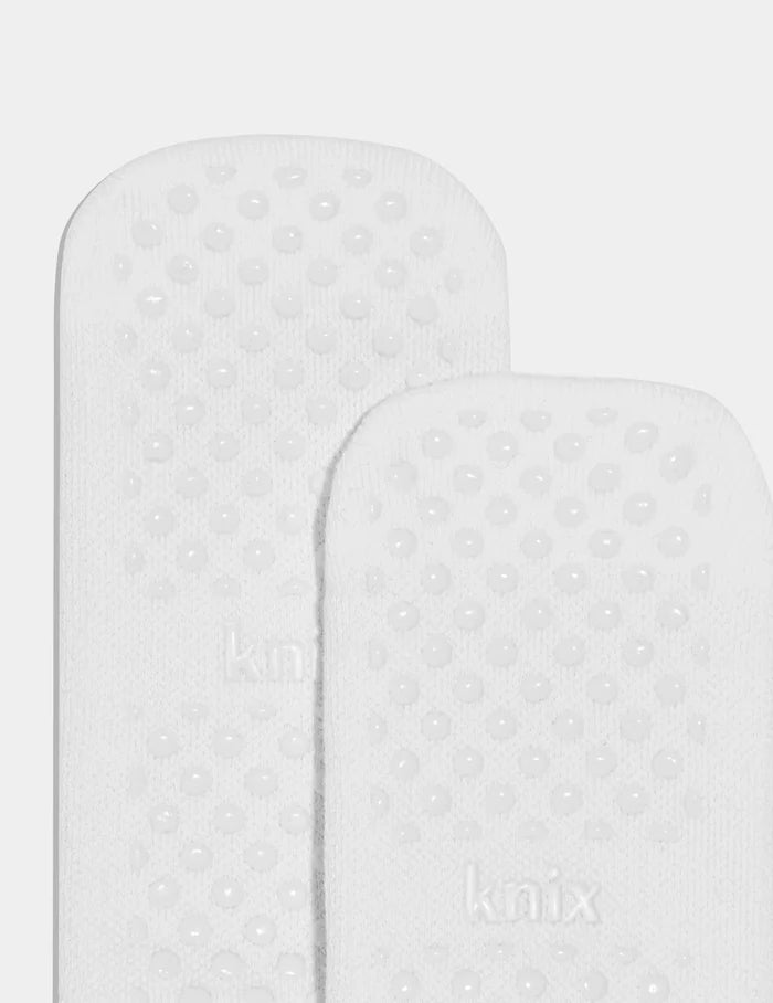 | Front view of model highlighting the coverage and fit | White