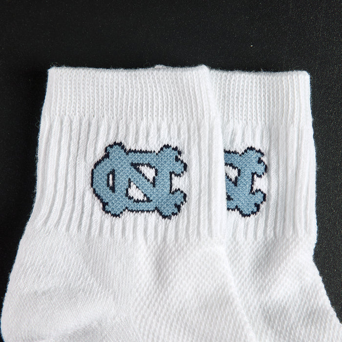 Del Campo North Carolina Interlocking NC golf socks, embroidered Carolina blue NC interlock detail