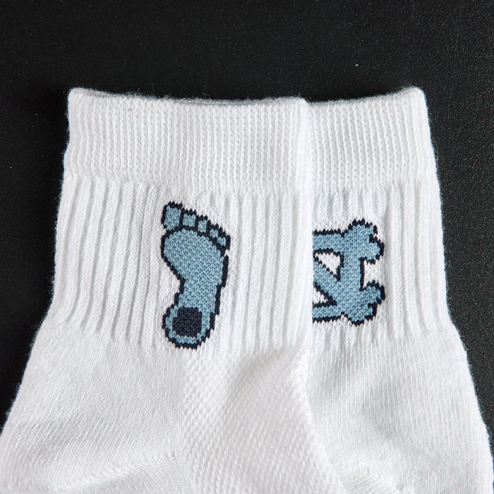 Close-up of the Tar Heel footprint on Del Campo North Carolina Pack golf socks